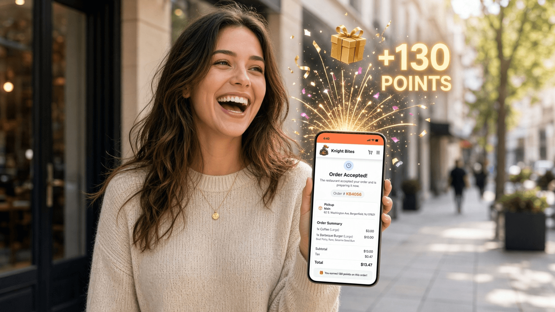 A smiling customer showing their restaurant order and earned loyalty points